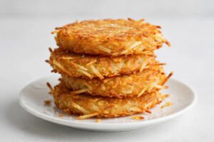 Stack of crispy golden hash brown patties
